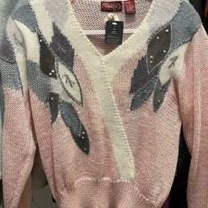 Elegant V-Neck Sweater with Leaf Design